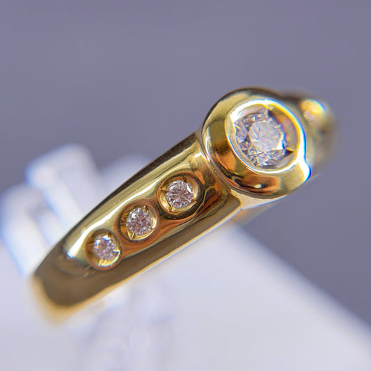750er Goldring 0.1 ct.